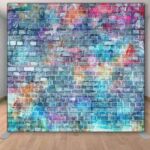 Our colorful brick graffiti wall photo booth backdrop. Colorful brick and stone wall of graffiti backdrop.