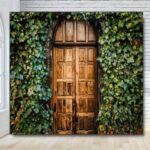 Wooden rustic garden doors with ivy covered walls Wooden rustic garden doors with ivy covered walls